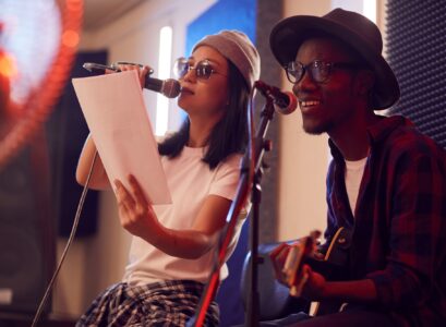 Musical Duo Singing in Studio