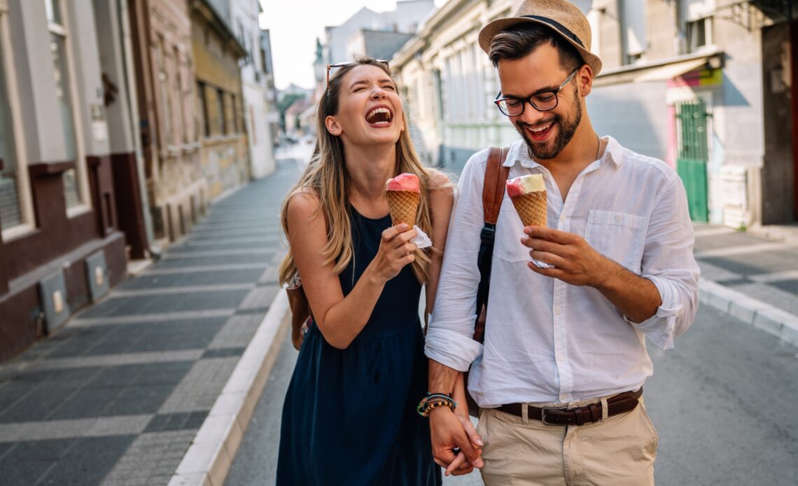 Portrait of happy couple having date and fun on vacation. People travel happiness concept